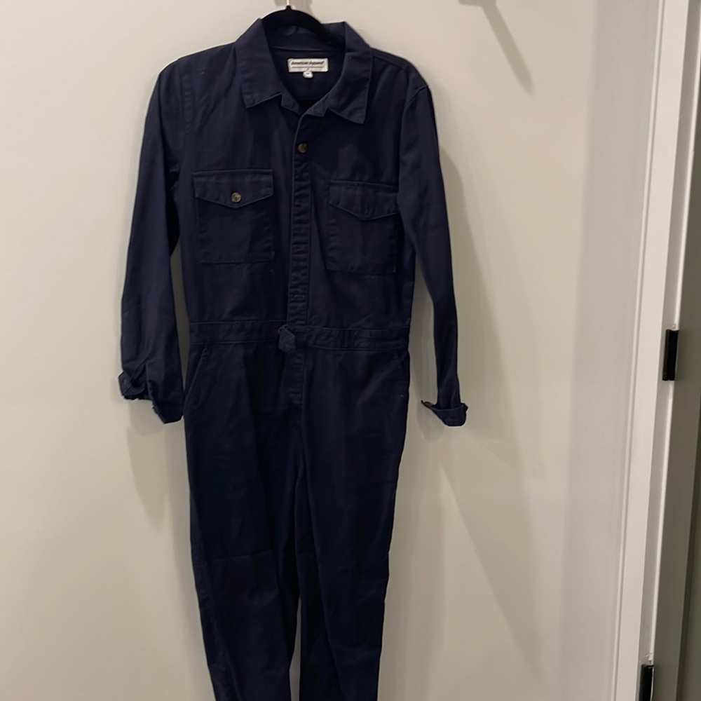 Navy blue utility jump suit.